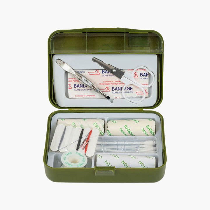 highlander forces cadet first aid kit  olive geen shows open box displaying contents