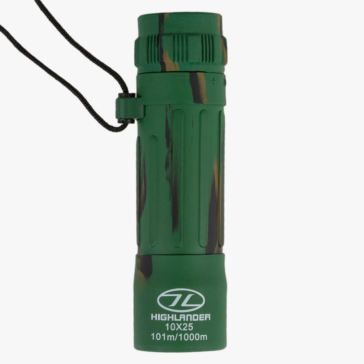 highlander forces dales monocular. green rubber cased cylindrical monocular with camo design and black neck lanyard. white text on base