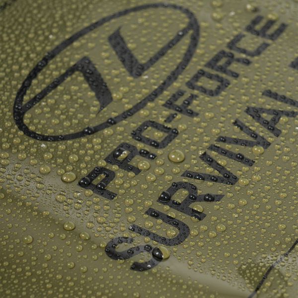 highlander olive green survival bivi bag folded. usage instructions in black lettering. water droplets demonstrate water repellency